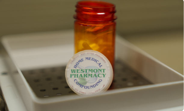 Compounded medication bottle with the Westmont Pharmacy Home Medical Compounding label